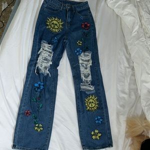 Cute painting design on distressed jeans